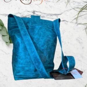 Tula Arriera en cuero y tela de telar manual